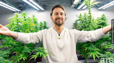 man in his grow room